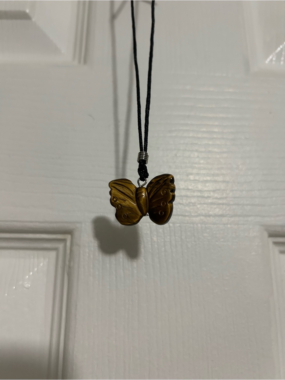 Butterfly Pendant Necklace in Brown Tiger Eye on Black Cord